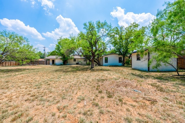 106 Heron, Highland Haven, TX 78654 - view of yard with an outdoor structure