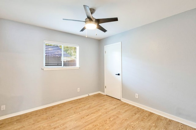 6100 Calmar Cv, Austin, TX 78721 - empty room featuring light wood-type flooring and a ceiling fan