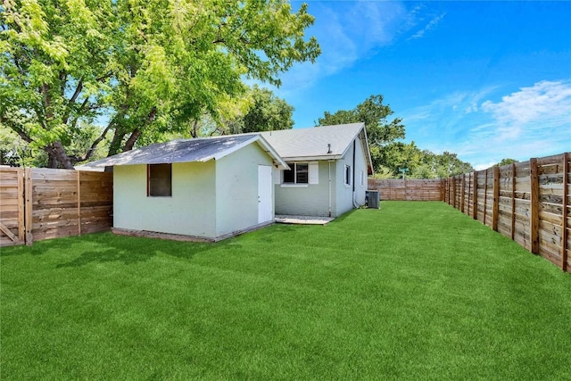 6100 Calmar Cv, Austin, TX 78721 - back of house with a fenced backyard