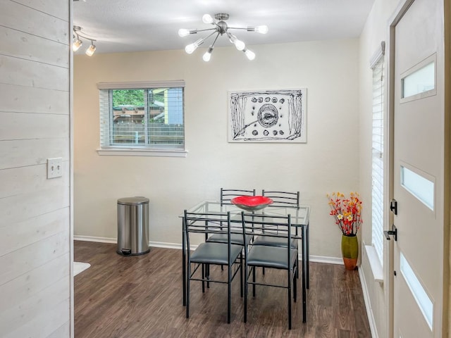 6100 Calmar Cv, Austin, TX 78721 - dining area featuring a chandelier and wood finished floors
