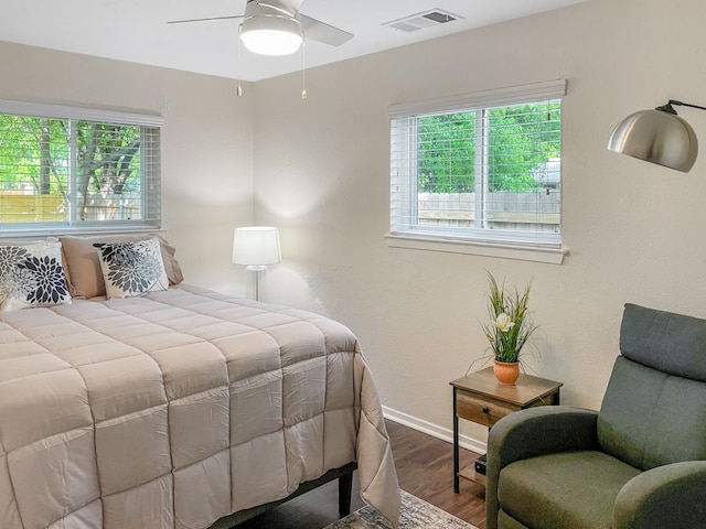 6100 Calmar Cv, Austin, TX 78721 - bedroom with wood finished floors and a ceiling fan