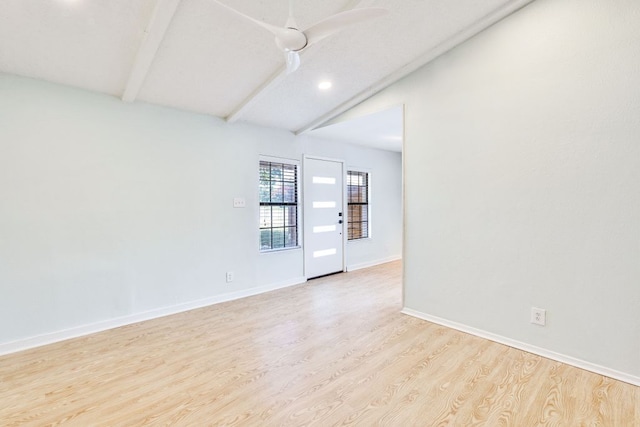 6100 Calmar Cv, Austin, TX 78721 - empty room with light wood finished floors and recessed lighting