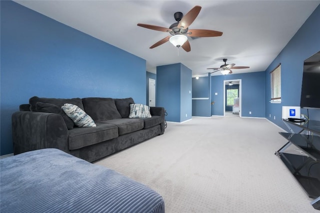 207 Presidio Dr, Leander, TX 78641 - carpeted living room with ceiling fan and baseboards