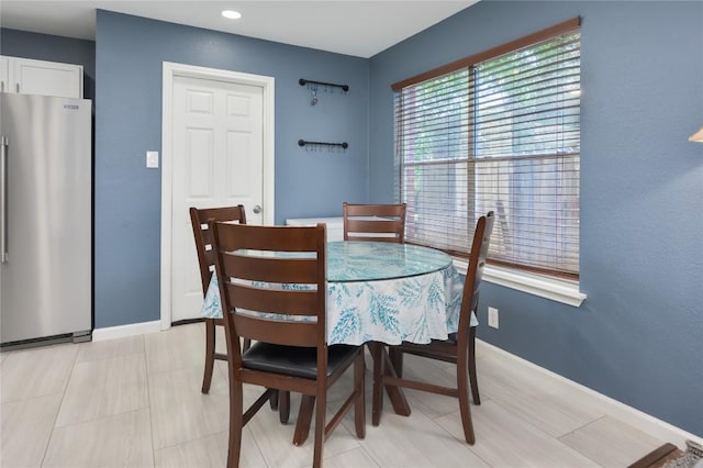 207 Presidio Dr, Leander, TX 78641 - dining room with baseboards and recessed lighting