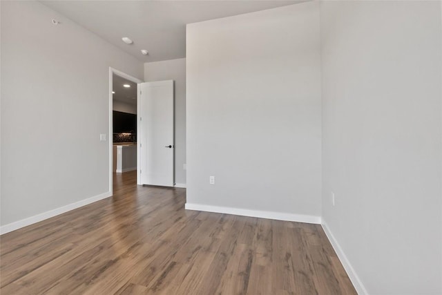 4510 Terry-O Ln Unit 415, Austin, TX 78745 - spare room featuring wood finished floors and baseboards