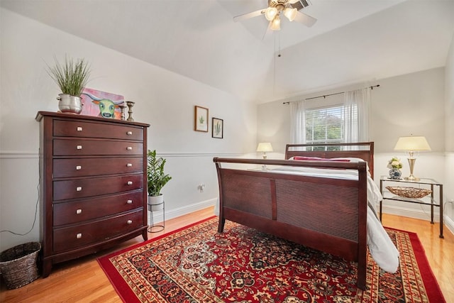 1215 Boerne Dr, Cedar Park, TX 78613 - bedroom with light wood-style flooring and vaulted ceiling