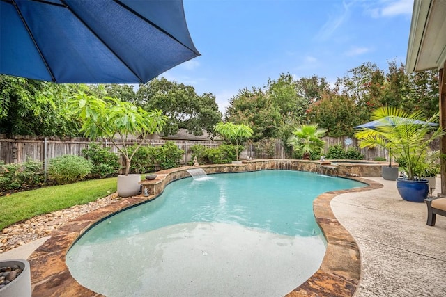 1215 Boerne Dr, Cedar Park, TX 78613 - view of pool with a fenced backyard, a pool with connected hot tub, and a patio area