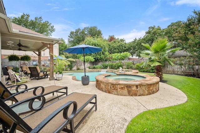 1215 Boerne Dr, Cedar Park, TX 78613 - view of swimming pool with a patio, ceiling fan, a fenced backyard, and a pool with connected hot tub