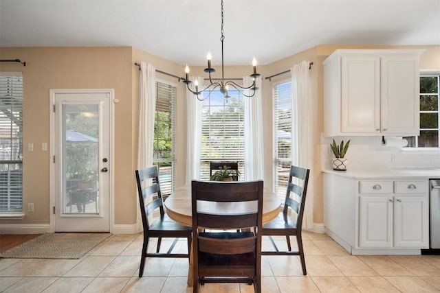 1215 Boerne Dr, Cedar Park, TX 78613 - dining room with a chandelier and light tile patterned flooring