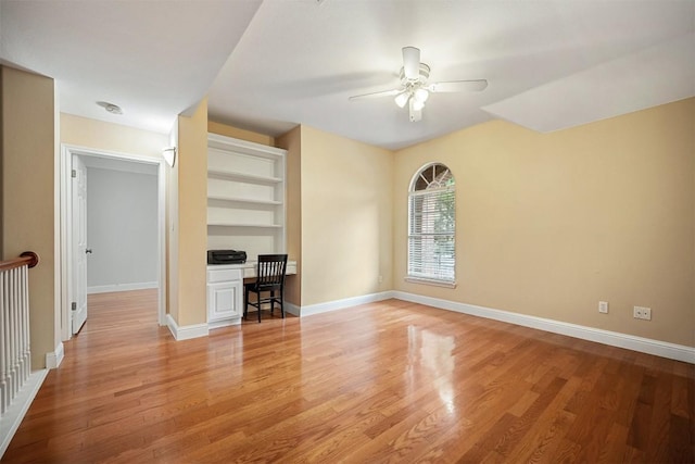 1215 Boerne Dr, Cedar Park, TX 78613 - unfurnished living room with a ceiling fan and light wood-style floors