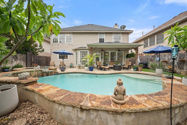 1215 Boerne Dr, Cedar Park, TX 78613 - view of swimming pool with a hot tub, a patio area, outdoor lounge area, and a fenced backyard