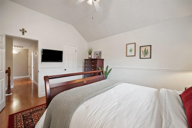 1215 Boerne Dr, Cedar Park, TX 78613 - bedroom featuring wood finished floors, lofted ceiling, and ceiling fan