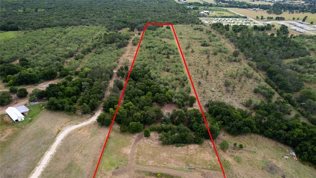 353 Littig Rd, Elgin, TX 78621 - aerial view of sparsely populated area featuring property boundaries highlighted and a heavily wooded area