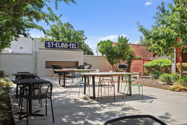 4361 S Congress Ave Unit 435, Austin, TX 78745 - view of patio featuring outdoor dining area
