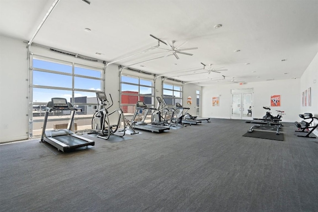 4361 S Congress Ave Unit 435, Austin, TX 78745 - exercise room with healthy amount of natural light and carpet