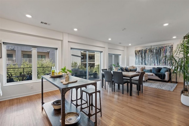 4361 S Congress Ave Unit 435, Austin, TX 78745 - dining room featuring light wood-type flooring and recessed lighting