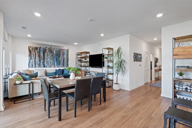4361 S Congress Ave Unit 435, Austin, TX 78745 - dining room featuring light wood-style flooring and recessed lighting