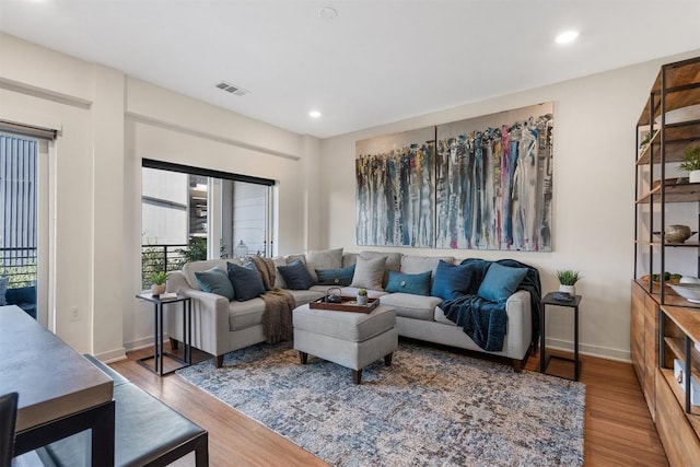 4361 S Congress Ave Unit 435, Austin, TX 78745 - living area with wood finished floors and recessed lighting