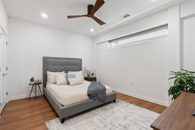 4361 S Congress Ave Unit 435, Austin, TX 78745 - bedroom with recessed lighting, wood finished floors, and a ceiling fan