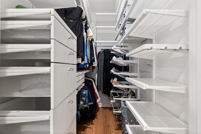 4361 S Congress Ave Unit 435, Austin, TX 78745 - walk in closet featuring wood finished floors