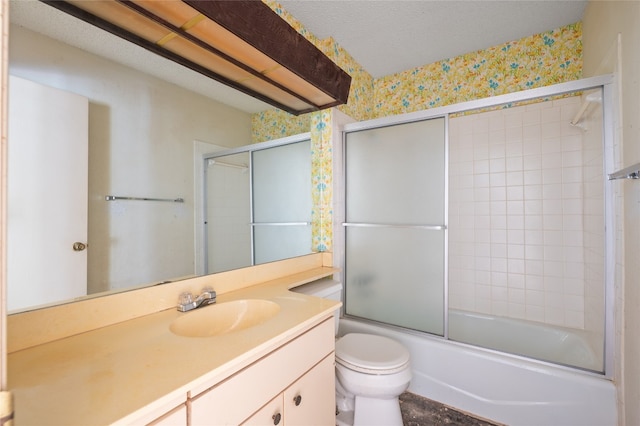 11702 Shoshone Dr, Austin, TX 78759 - bathroom with wallpapered walls, vanity, and bath / shower combo with glass door
