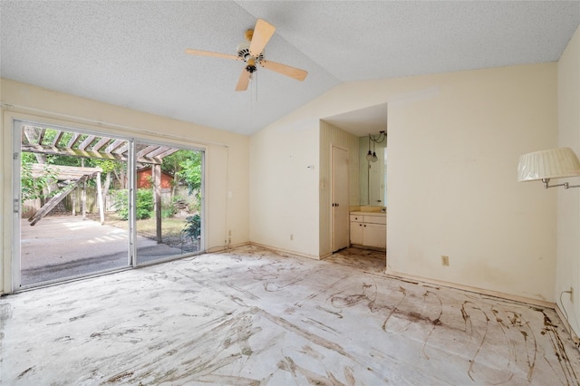 11702 Shoshone Dr, Austin, TX 78759 - empty room featuring vaulted ceiling, ceiling fan, and a textured ceiling