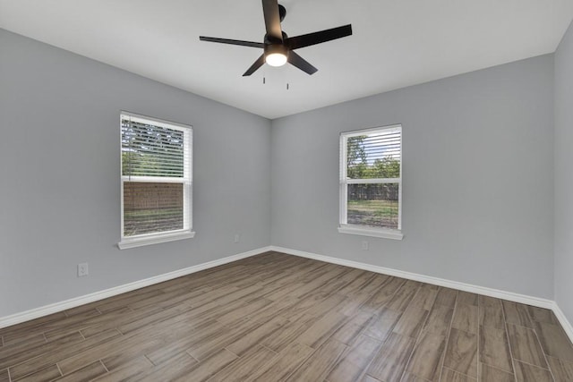 5063 Cedarside, San Marcos, TX 78666 - unfurnished room featuring wood finished floors and a ceiling fan