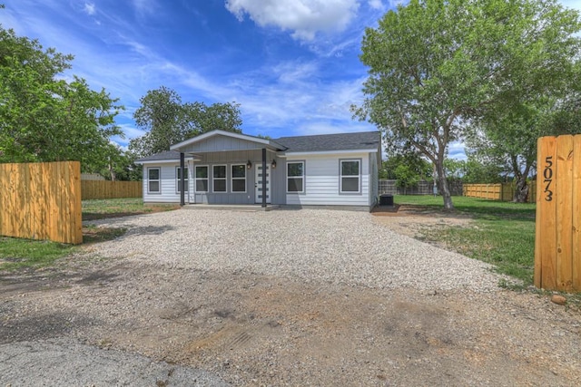 5063 Cedarside, San Marcos, TX 78666 - view of front facade with gravel driveway