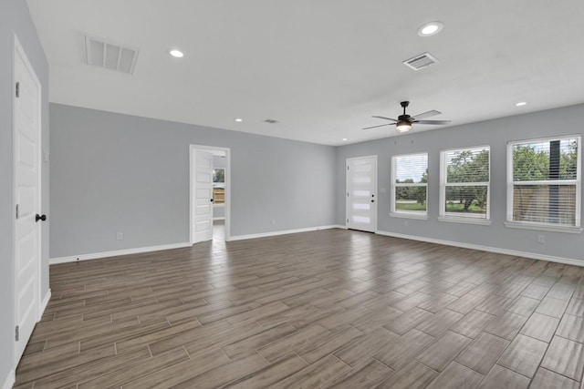 5063 Cedarside, San Marcos, TX 78666 - unfurnished living room with ceiling fan, dark wood-type flooring, and recessed lighting