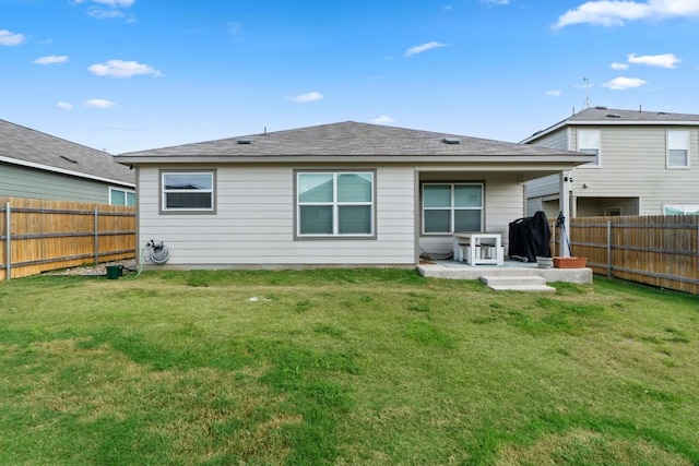 105 Perfect World Loop, Jarrell, TX 76537 - back of house with a fenced backyard and a shingled roof
