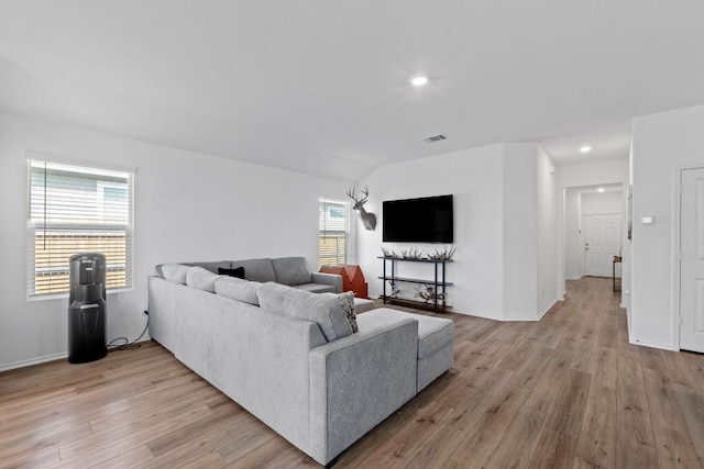 105 Perfect World Loop, Jarrell, TX 76537 - living room with light wood finished floors and recessed lighting