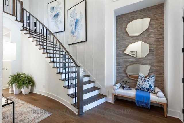 1401 Snowdrop Dr, Georgetown, TX 78628 - staircase with wood finished floors and baseboards
