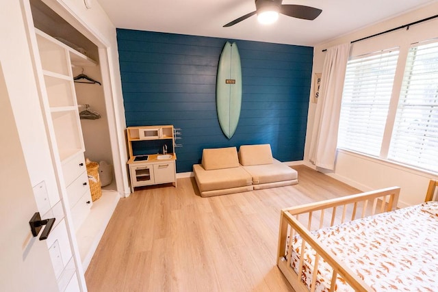 11436 Bristle Oak Trl, Austin, TX 78750 - bedroom with light wood-style floors, multiple windows, and ceiling fan