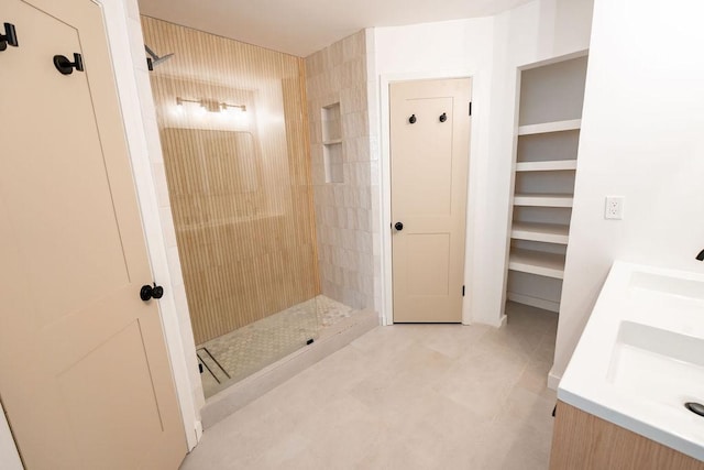 11436 Bristle Oak Trl, Austin, TX 78750 - bathroom with double vanity and tiled shower