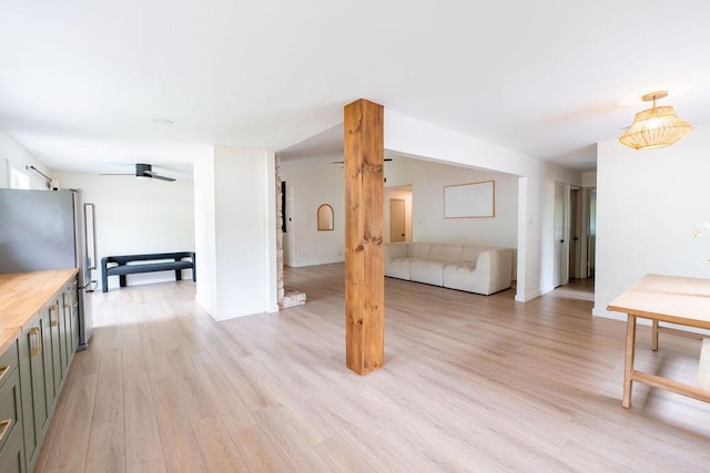 11436 Bristle Oak Trl, Austin, TX 78750 - unfurnished living room with light wood-style flooring and a ceiling fan