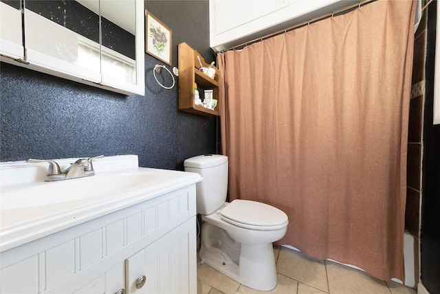 936 Cheatham St, San Marcos, TX 78666 - bathroom featuring tile patterned floors, vanity, and shower / bathtub combination with curtain