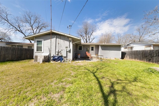 936 Cheatham St, San Marcos, TX 78666 - back of house with a fenced backyard