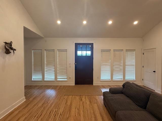 305 Goertz Dr, Red Rock, TX 78662 - foyer with vaulted ceiling, light wood-type flooring, and recessed lighting