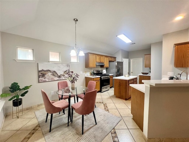 612 Thrush Dr, Leander, TX 78641 - dining space featuring lofted ceiling and light tile patterned flooring