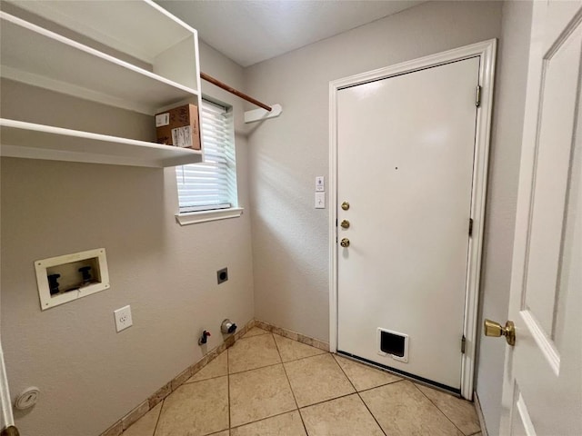 612 Thrush Dr, Leander, TX 78641 - washroom with hookup for a washing machine, hookup for a gas dryer, electric dryer hookup, and light tile patterned floors
