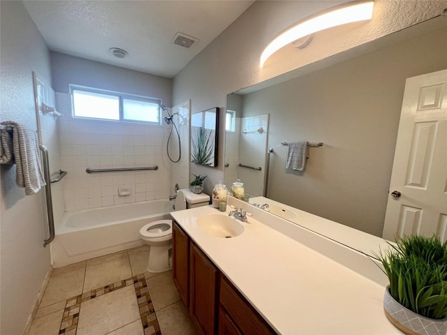 612 Thrush Dr, Leander, TX 78641 - full bath featuring bathing tub / shower combination, vanity, and tile patterned flooring