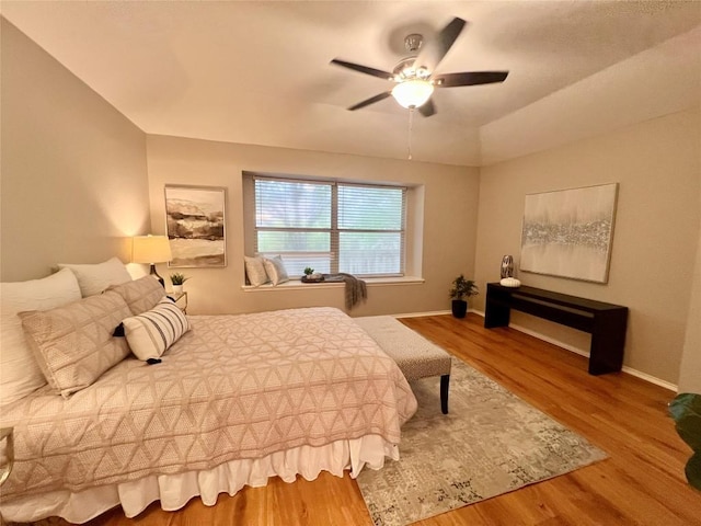 612 Thrush Dr, Leander, TX 78641 - bedroom with wood finished floors and ceiling fan