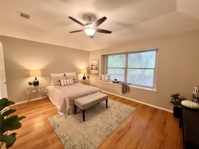612 Thrush Dr, Leander, TX 78641 - bedroom featuring wood finished floors and ceiling fan