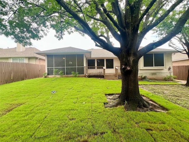 612 Thrush Dr, Leander, TX 78641 - rear view of house featuring a sunroom and a fenced backyard