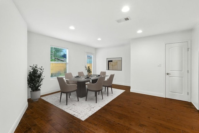 1612 Westmoor Dr, Austin, TX 78723 - dining area with dark wood-style flooring and recessed lighting