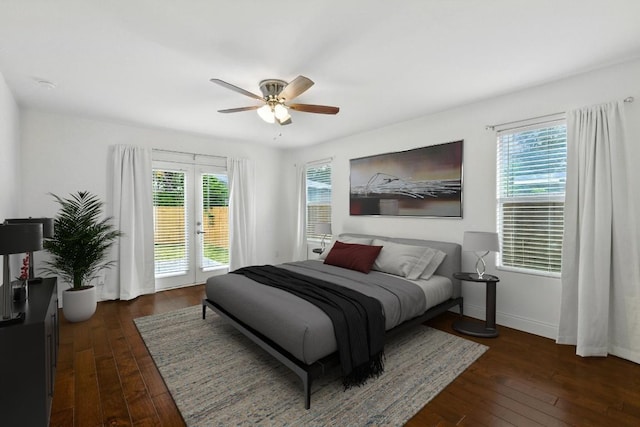 1612 Westmoor Dr, Austin, TX 78723 - bedroom with access to outside, dark wood-style flooring, and ceiling fan