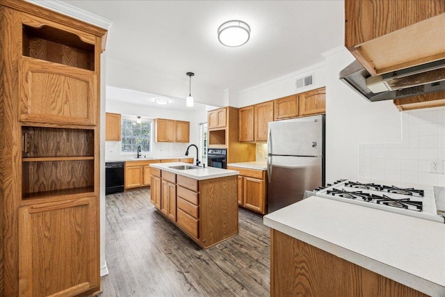 8516 Rockwood Ln, Austin, TX 78757 - kitchen featuring black appliances, extractor fan, a center island with sink, dark wood-type flooring, and ornamental molding