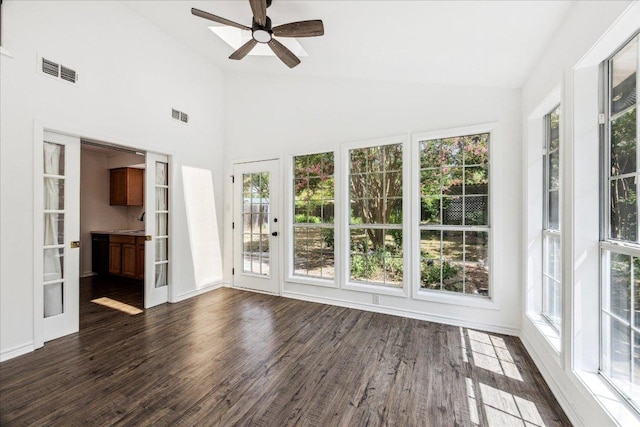 8516 Rockwood Ln, Austin, TX 78757 - unfurnished sunroom featuring plenty of natural light, wood finished floors, and high vaulted ceiling