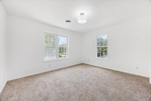 8516 Rockwood Ln, Austin, TX 78757 - spare room featuring carpet flooring