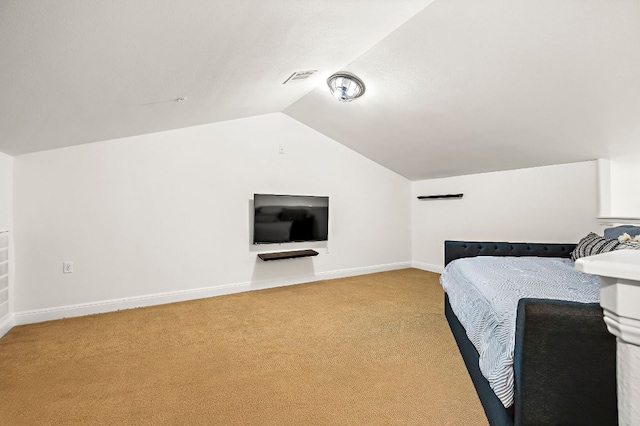 427 Marina Village Cv Unit 427, Austin, TX 78734 - bedroom with light colored carpet and vaulted ceiling